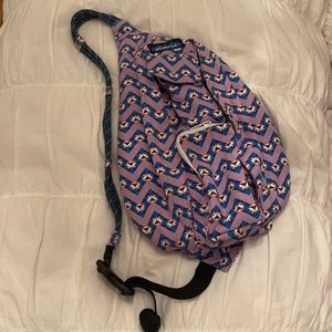 Brand Kavu, colors are purple, blue, white, light pink. Used once.